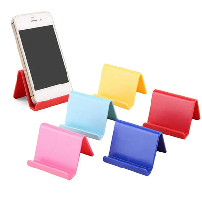 Candy colour plastic phone holder showing 6cm width and 4.5cm height dimensions