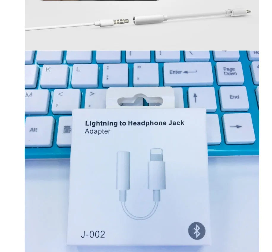 White Lightning to 3.5mm audio adapter for iPhone compatibility.
