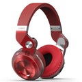 Over-ear Bluetooth headset with card plug-in subwoofer in black, blue, red, or white colour options.