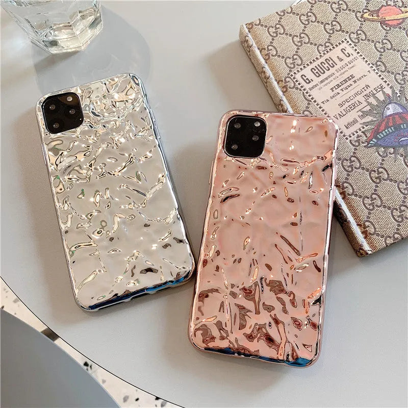 Clear electroplated rose gold iPhone back cover case on an iPhone 15 Pro Max.