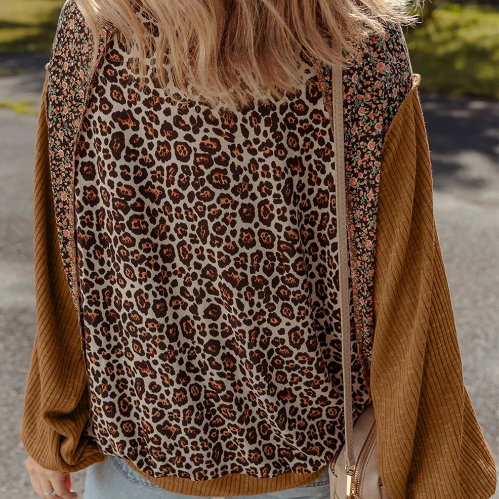Women's brown leopard print loose fit sweater with long sleeves and hollow knit construction