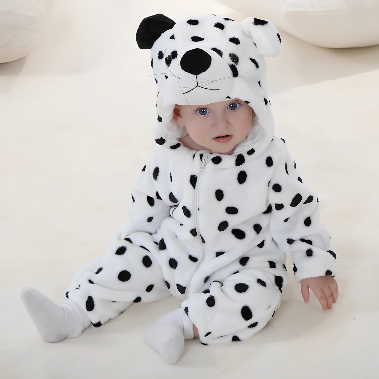 Cotton flannel baby romper with animal print design for winter wear, showing reinforced stitching and soft fabric texture