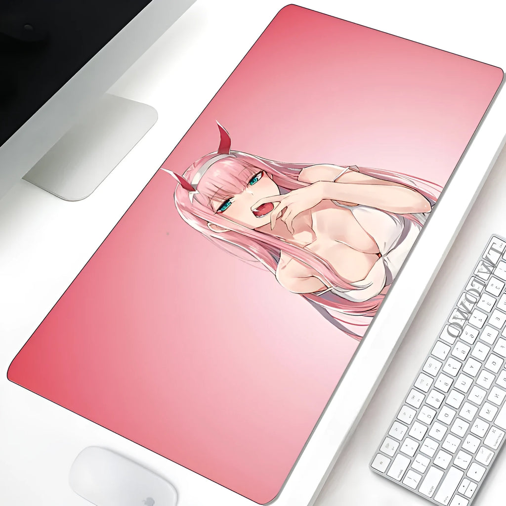 Pink Darling anime cloth keyboard mat on a desk with a mouse and keyboard
