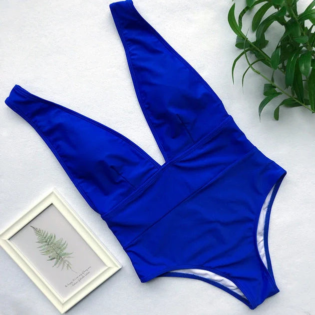 Women's black one-piece swimsuit with steel support structure and Brazilian bikini design