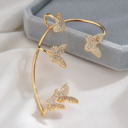 Sparkling butterfly-shaped ear cuffs with zircon stones, designed for fashionable jewelry without piercing