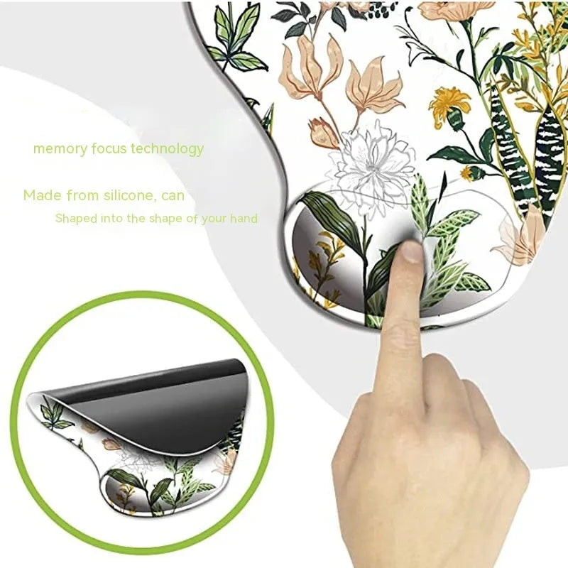 Black silicone keyboard wrist rest with floral pattern and adjustable wrist strap
