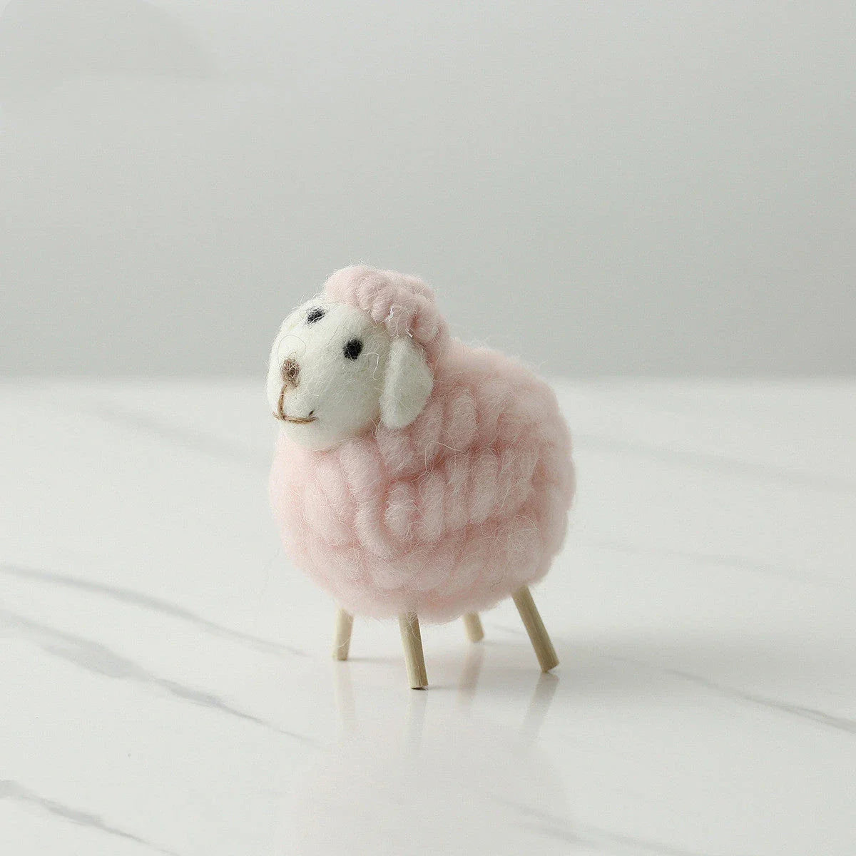 Adorable felt sheep miniature figurines in various colours and sizes for home decoration