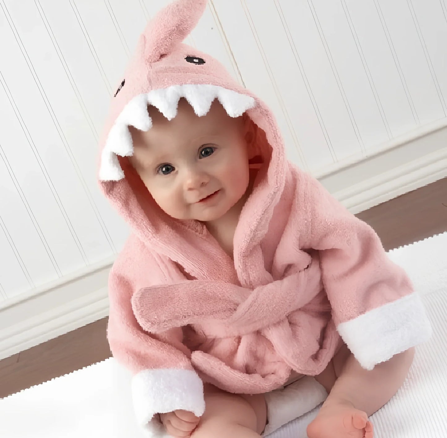 Cotton baby bathrobe with animal hood showing panda design, belt fastening, and absorbent fabric