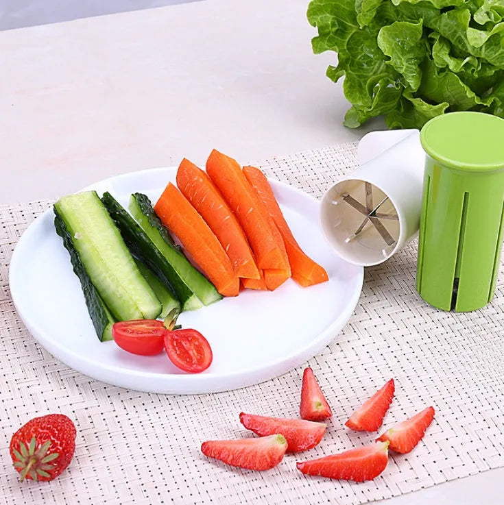 White kitchen vegetable slicer with six stainless steel blades for cucumbers and carrots.
