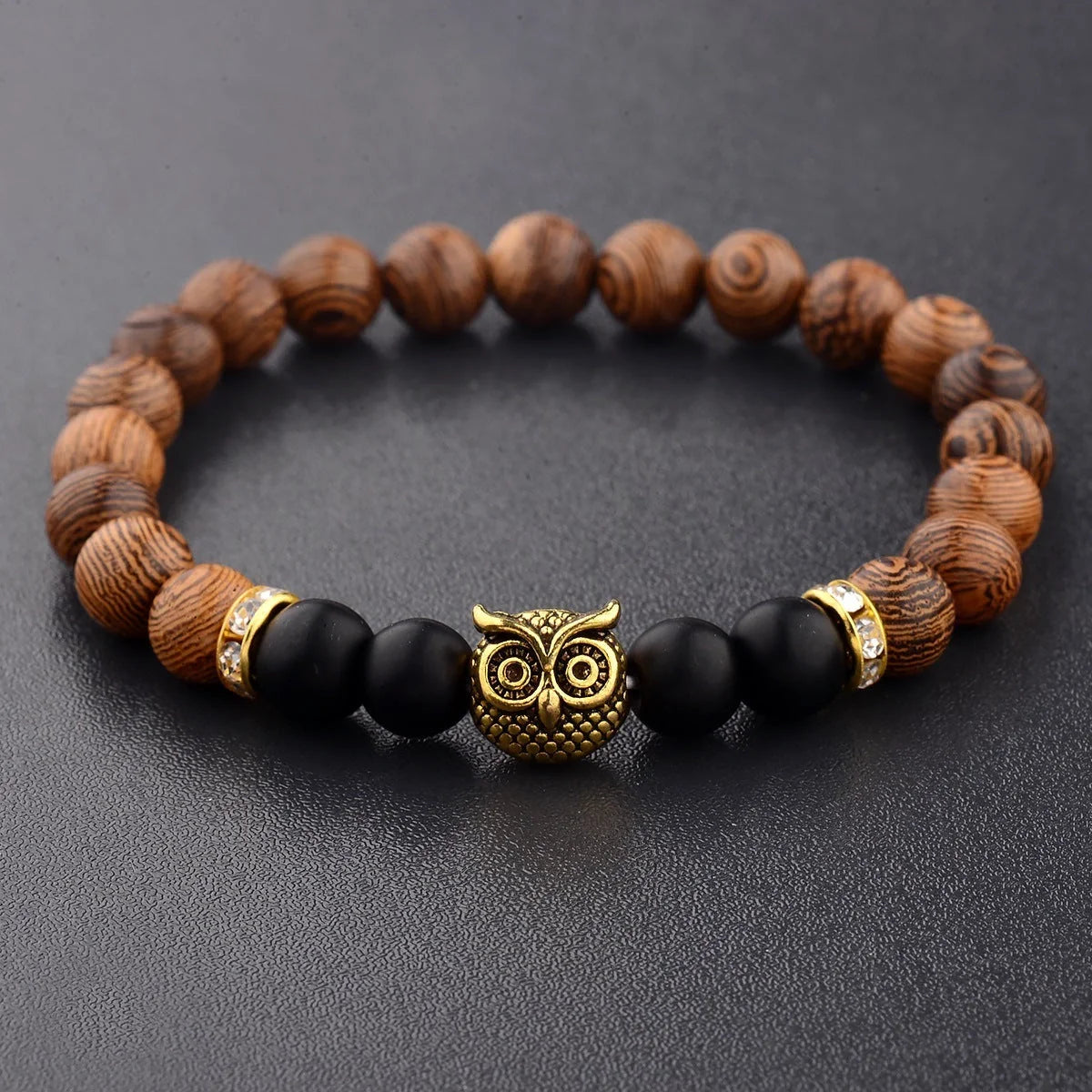 Owl frosted stone lifeline wood grain bracelet in black and gold, adjustable for a perfect fit