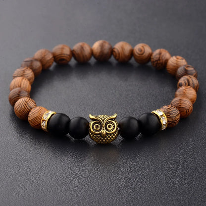 Owl frosted stone lifeline wood grain bracelet in black and gold, adjustable for a perfect fit