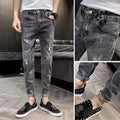 Men's high-waisted denim jeans in casual style with button fly and elastic fabric