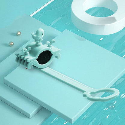 Children's faucet extender in blue, pink, and purple colours