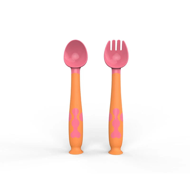 Training Twisting Spoon Fork Set for babies in blue, purple, pink, and yellow