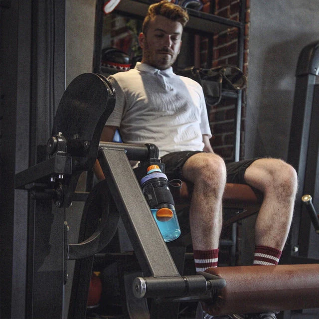 Adjustable magnetic water cup belt in black, blue, and green for fitness and outdoor use