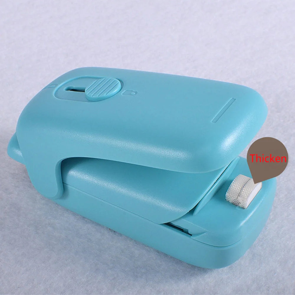 Mini plastic bag sealing machine in blue with open knife and double heating wire