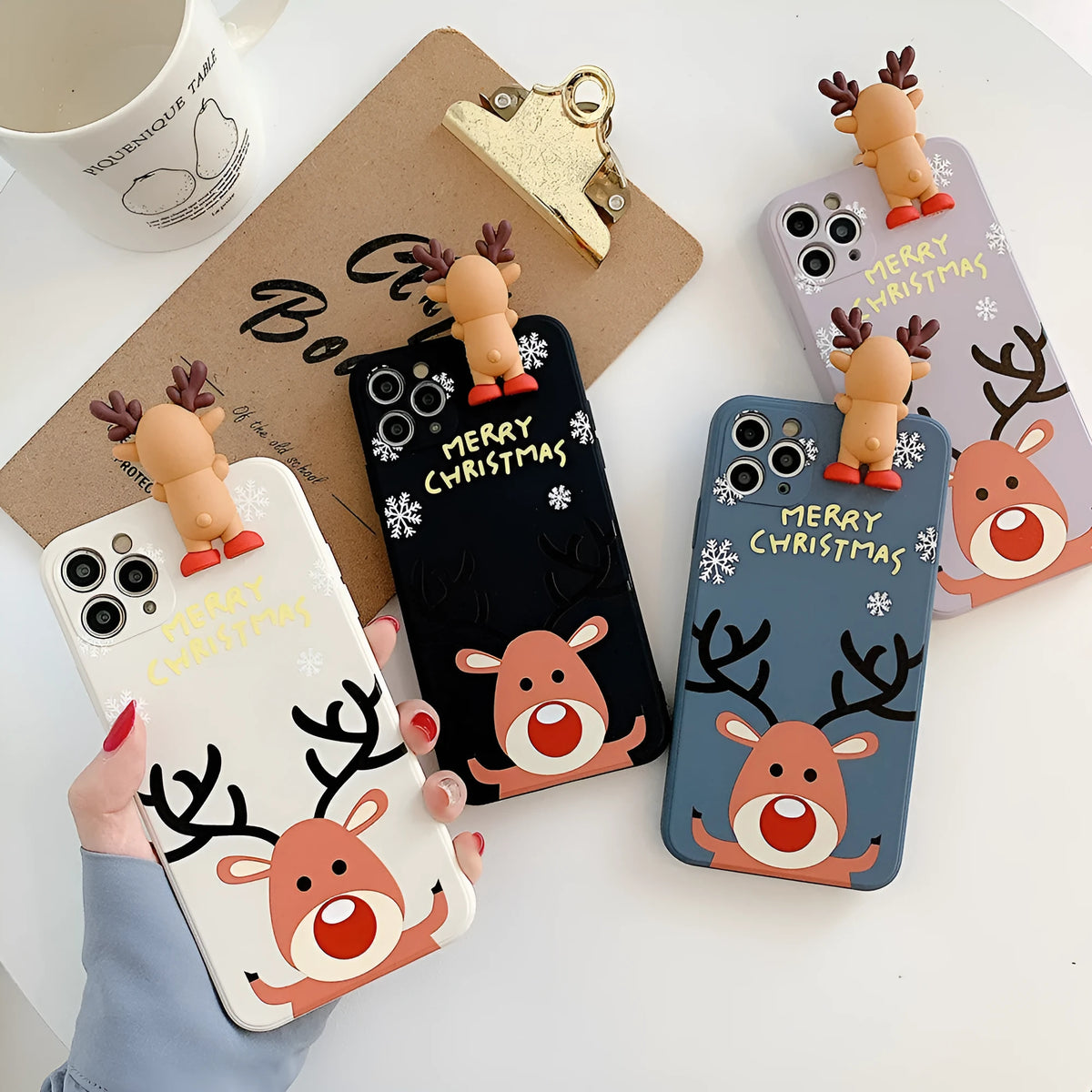 Christmas mobile phone case with deer design in silicone for Apple iPhone, available in white, pink, black, red, blue, green