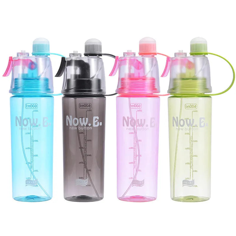 Green portable outdoor mist spray cup with handle, leakproof pad, and visible water level scale.