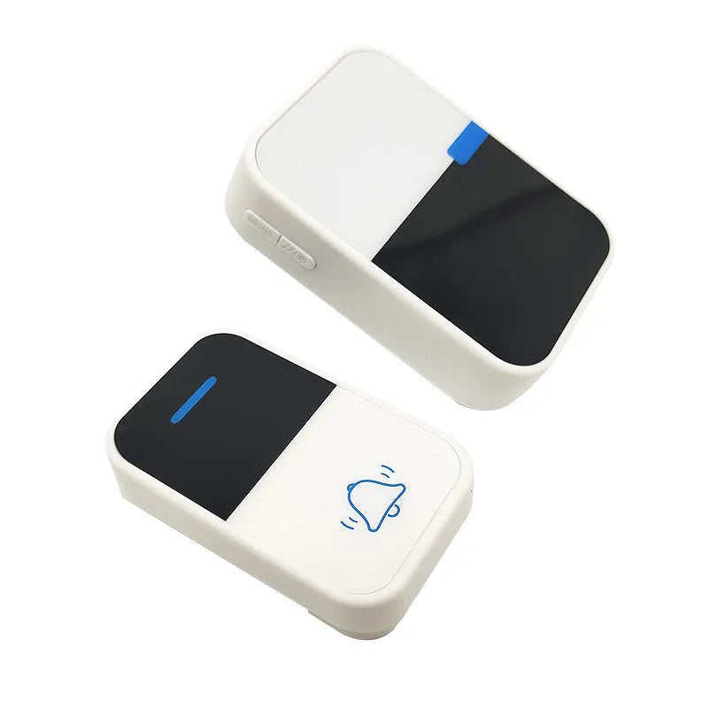 White modern wireless doorbell receiver and transmitter unit on a plain background.