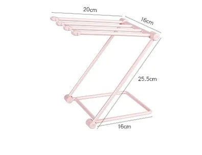 Foldable plastic dishcloth shelf in Nordic colours for kitchen bottle storage