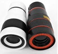12x magnification phone telescope lens with mounting clip on a smartphone