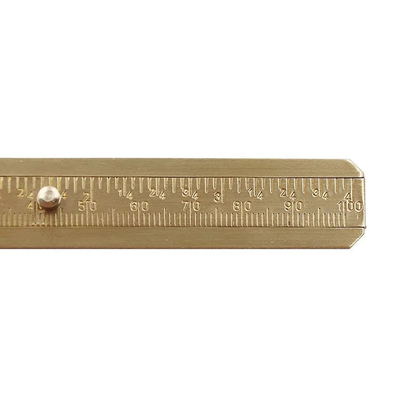 Double scale mini copper caliper with brass body, 100mm range, showing dual metric and imperial scales