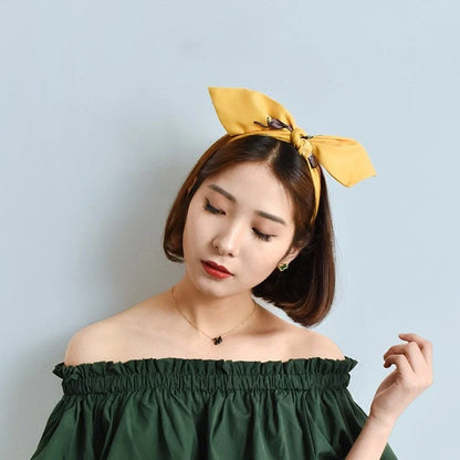 Blue and yellow cloth cat hair band with original tiara design measuring 3cm wide