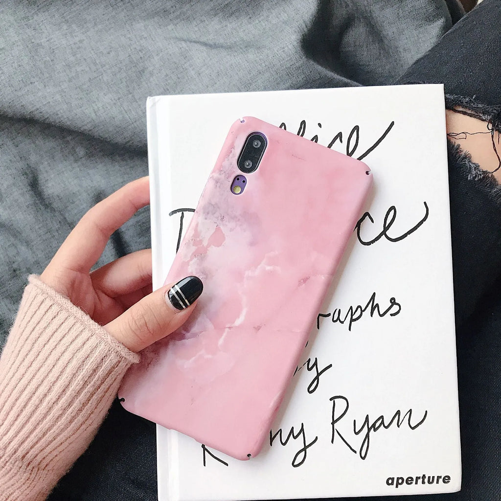 Solid black and solid pink painted phone back covers for Huawei and Honor smartphones on a white background.