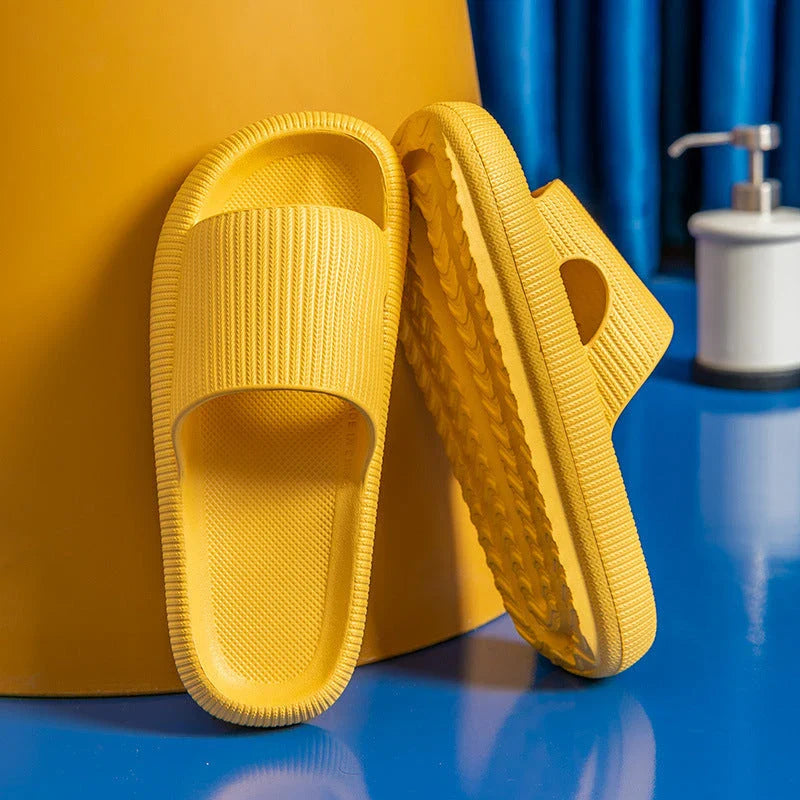 Stylish and comfortable EVA bathroom slippers with soft cushioned soles and anti-slip design, available in a variety of vibrant colors.