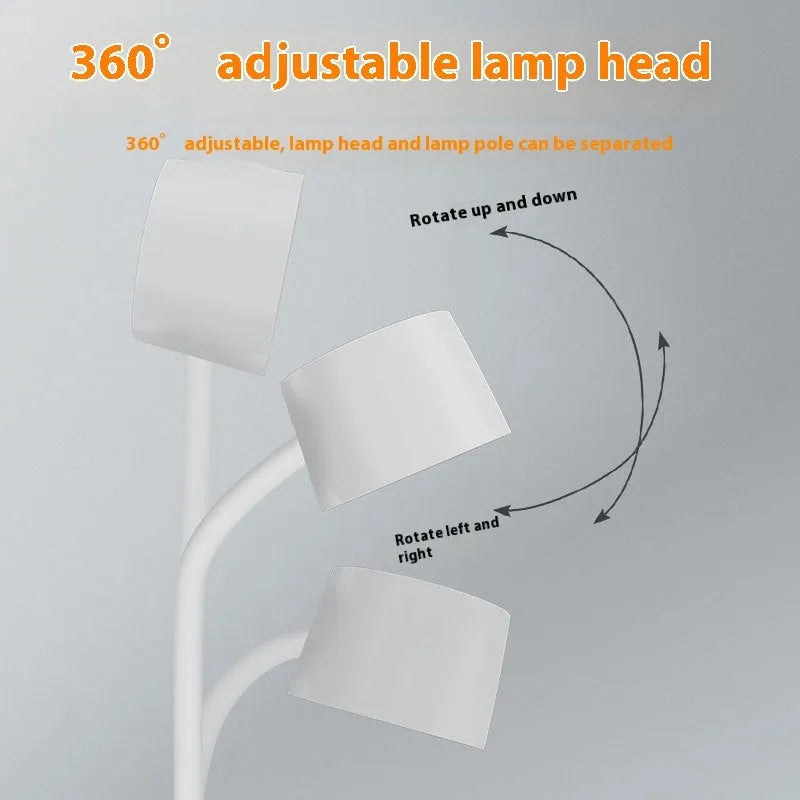 White intelligent bedside lamp with digital clock display and wireless charging surface.