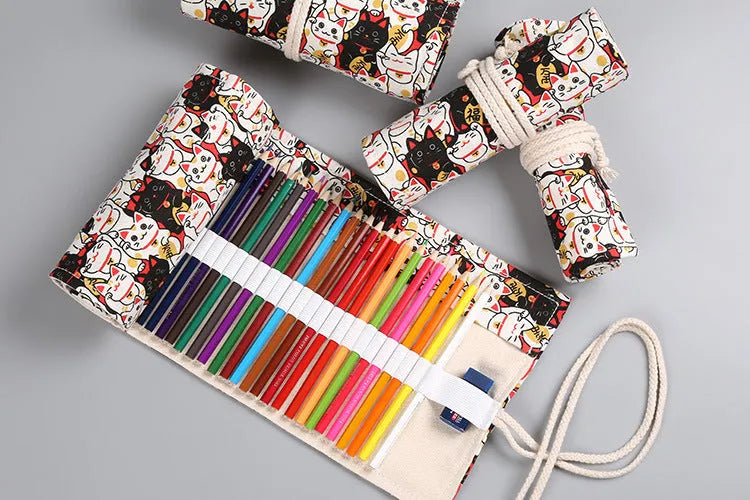 Canvas pencil wrap roll up case with multiple elastic bands holding pens and pencils, in a compact roll.