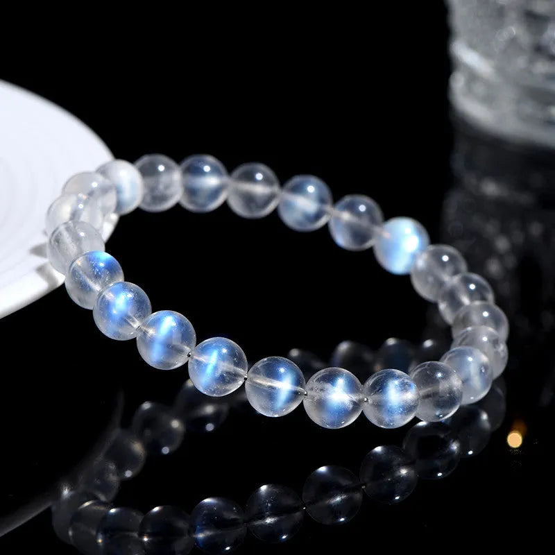 Natural cream body crystal bracelet on wrist showing smooth ground beads.