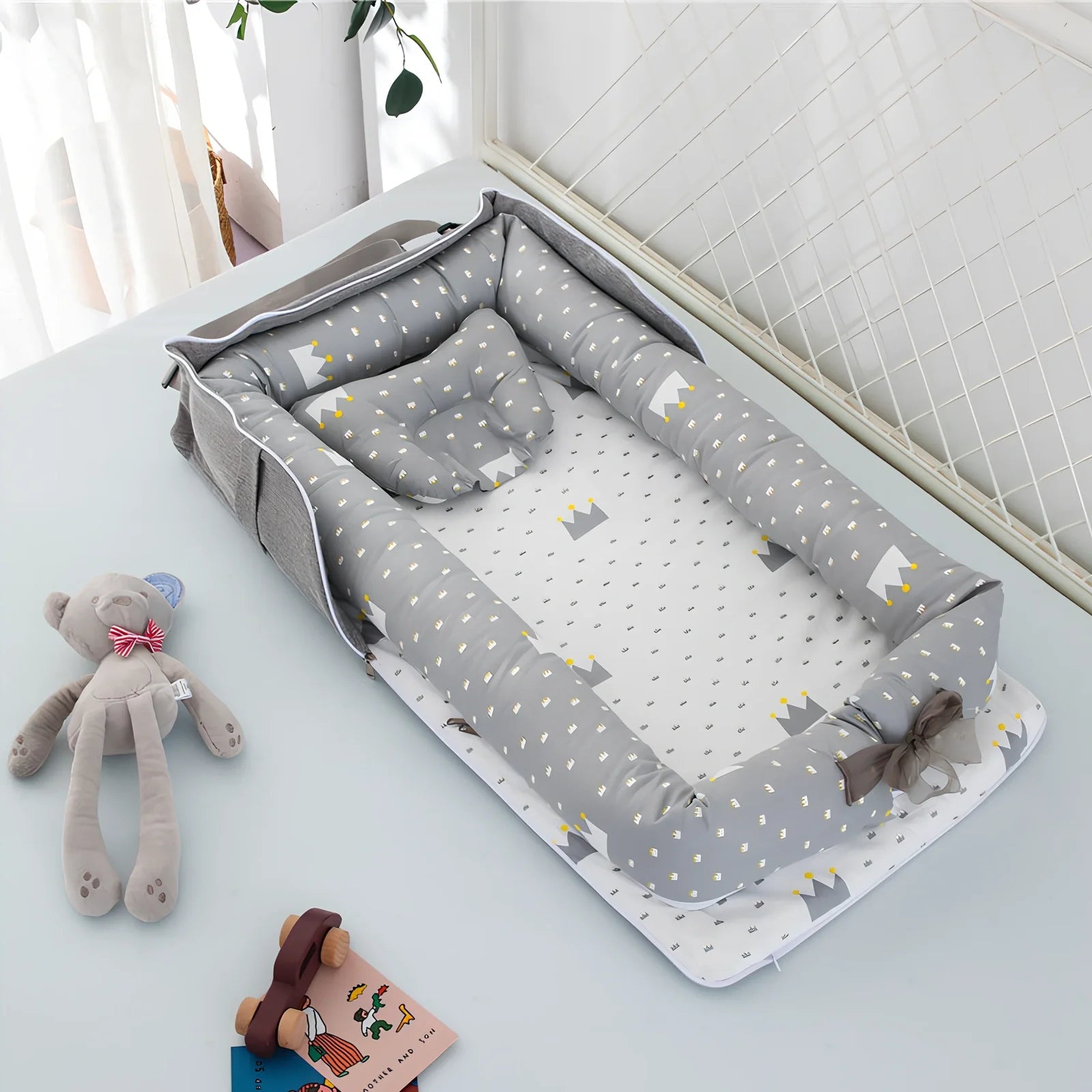 Foldable cotton portable baby crib in Animal World Blue, 90x50 cm with pillow and strap, weighing 1.3 kg