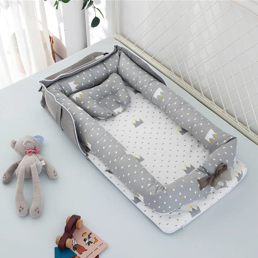 Foldable cotton portable baby crib in Animal World Blue, 90x50 cm with pillow and strap, weighing 1.3 kg