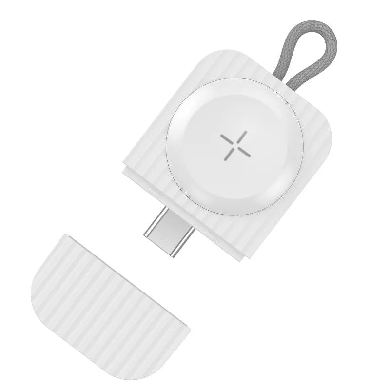 White magnetic wireless charger for Apple Watch with Type-C and USB-A interfaces on a desk