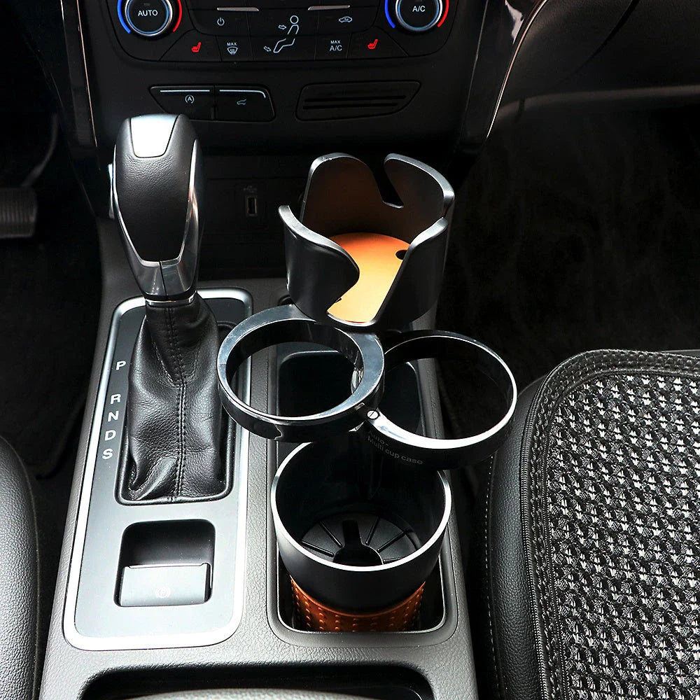 Rotatable ABS car cup holder in green, black, and pink for convenient drink storage