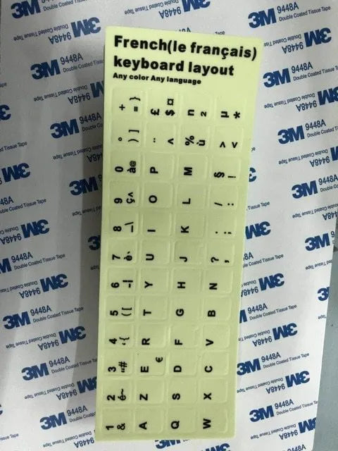Yellow PVC keyboard stickers with glowing multilingual characters for desktop and laptop computers