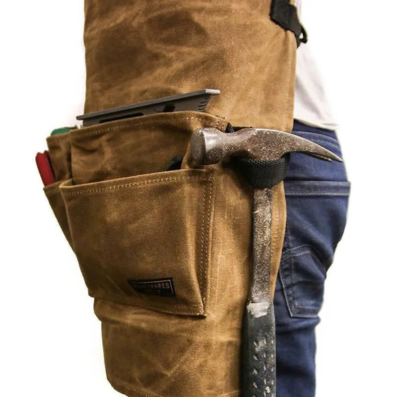 Yellow leather webbing work apron with multiple tool pockets and adjustable straps