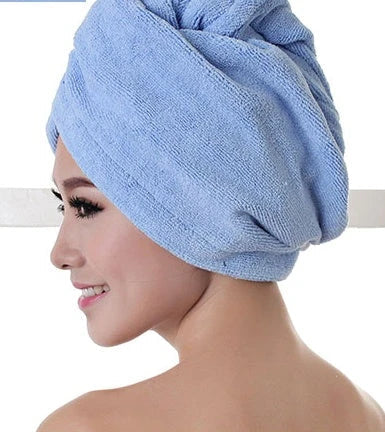 Absorbent microfiber hair turban in various vibrant colours, designed for fast and convenient drying