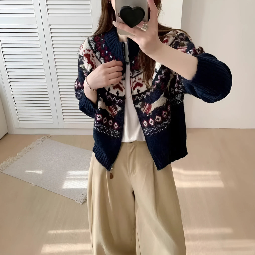 Ethnic Jacquard pattern pullover sweater with 3D effect in loose fit.