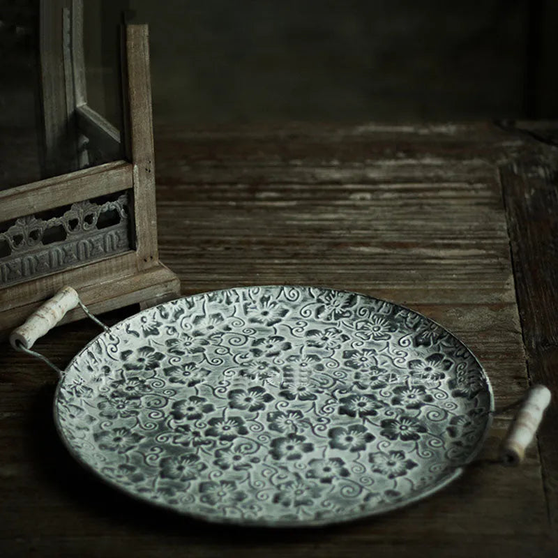 Round black wrought iron storage tray with European styling for jewellery and food organisation