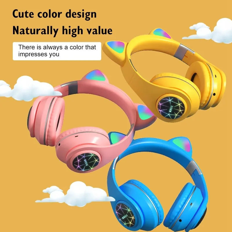 Cat ear design wireless Bluetooth headphones shown in multiple colours including pink, black, and blue.