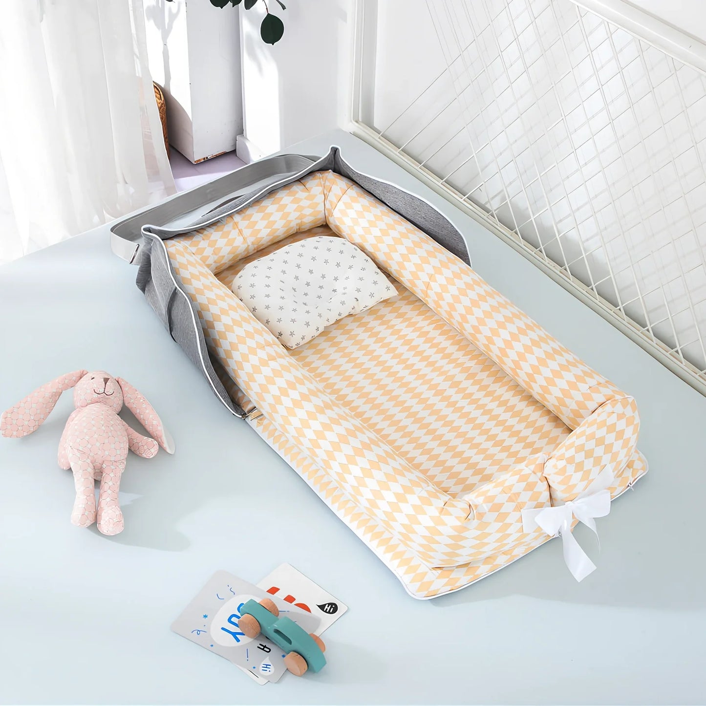 Foldable cotton portable baby crib in Animal World Blue, 90x50 cm with pillow and strap, weighing 1.3 kg