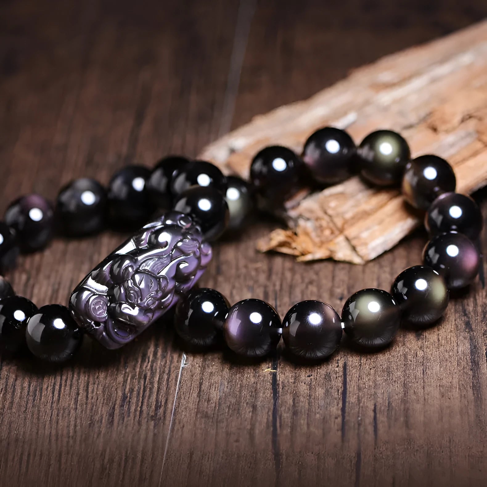 Polished crystal Pi Xiu bracelet with geometric beads in ethnic unisex style.