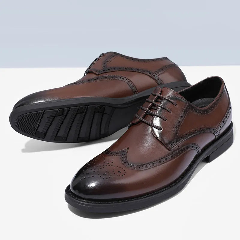Men's black and brown brogue leather shoes with traditional perforated detailing