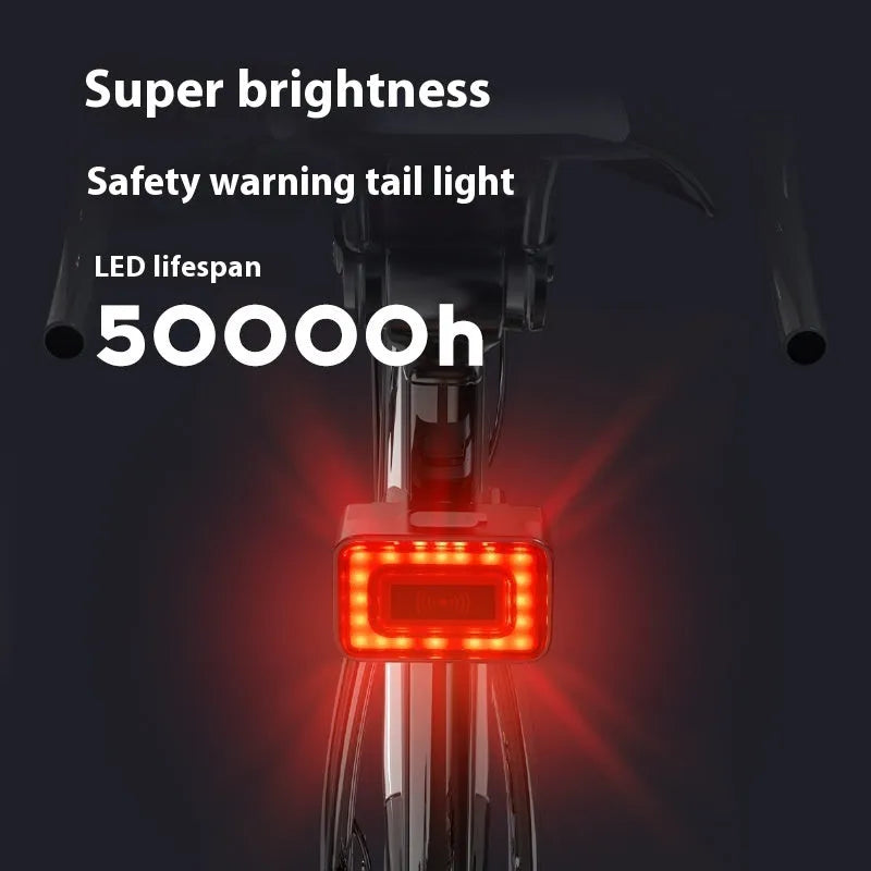 Smart millimeter wave radar bicycle taillight with double mounting bracket on a black background.