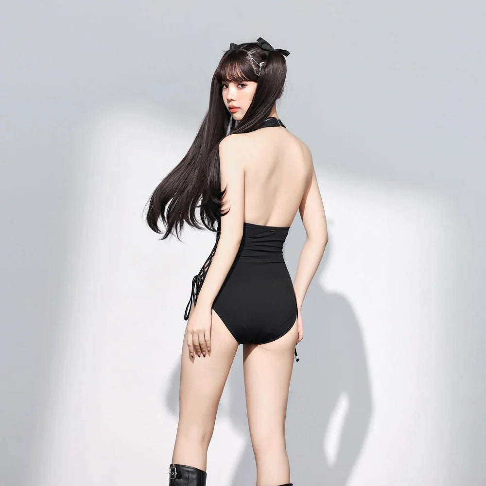 Black women's one-piece swimsuit with V-neck design and hollow straps, polypropylene fibre fabric