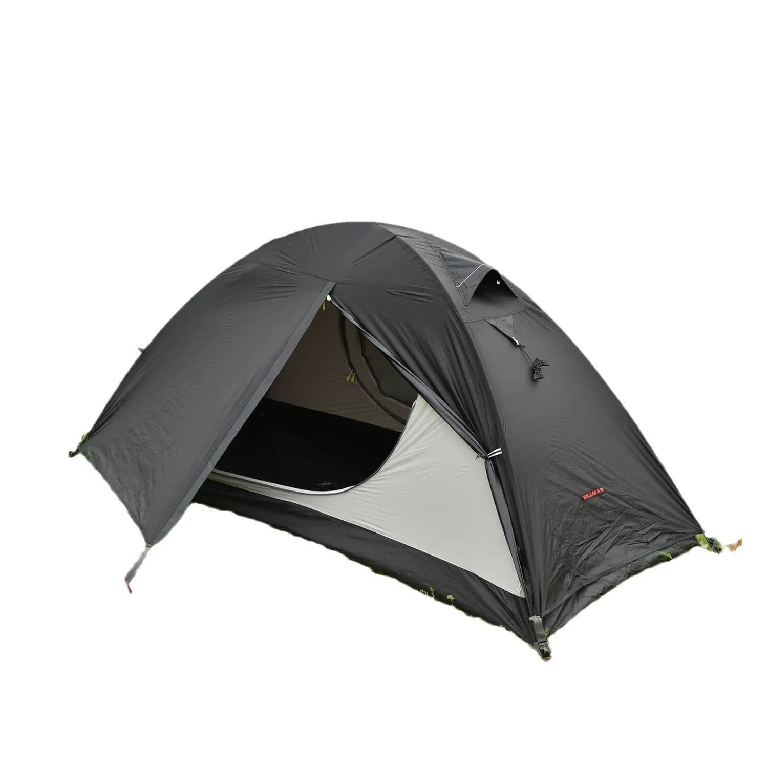 Lightweight red single person tent with aluminium poles pitched outdoors.