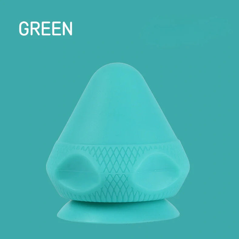 Green silicone massage cone with suction cup, measuring 62mm by 75mm for muscle relief
