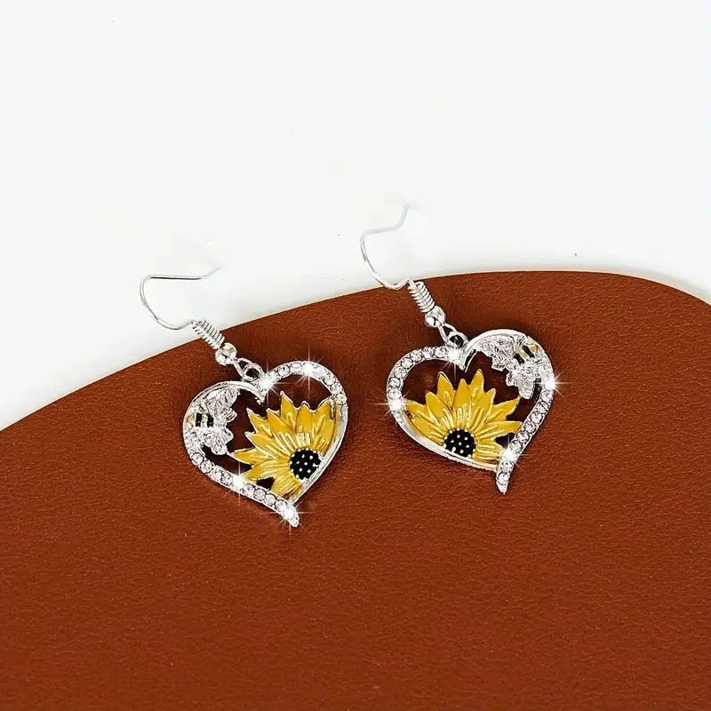 Silver alloy fashion earrings with bee and sunflower heart designs